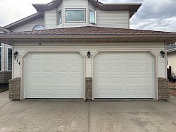 2 9x7 garage doors